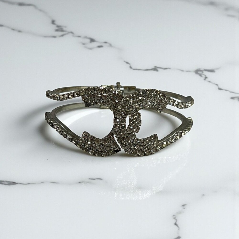 Silver-Tone Rhinestone Bangle Bracelet With Double C Design (Missing Stone)